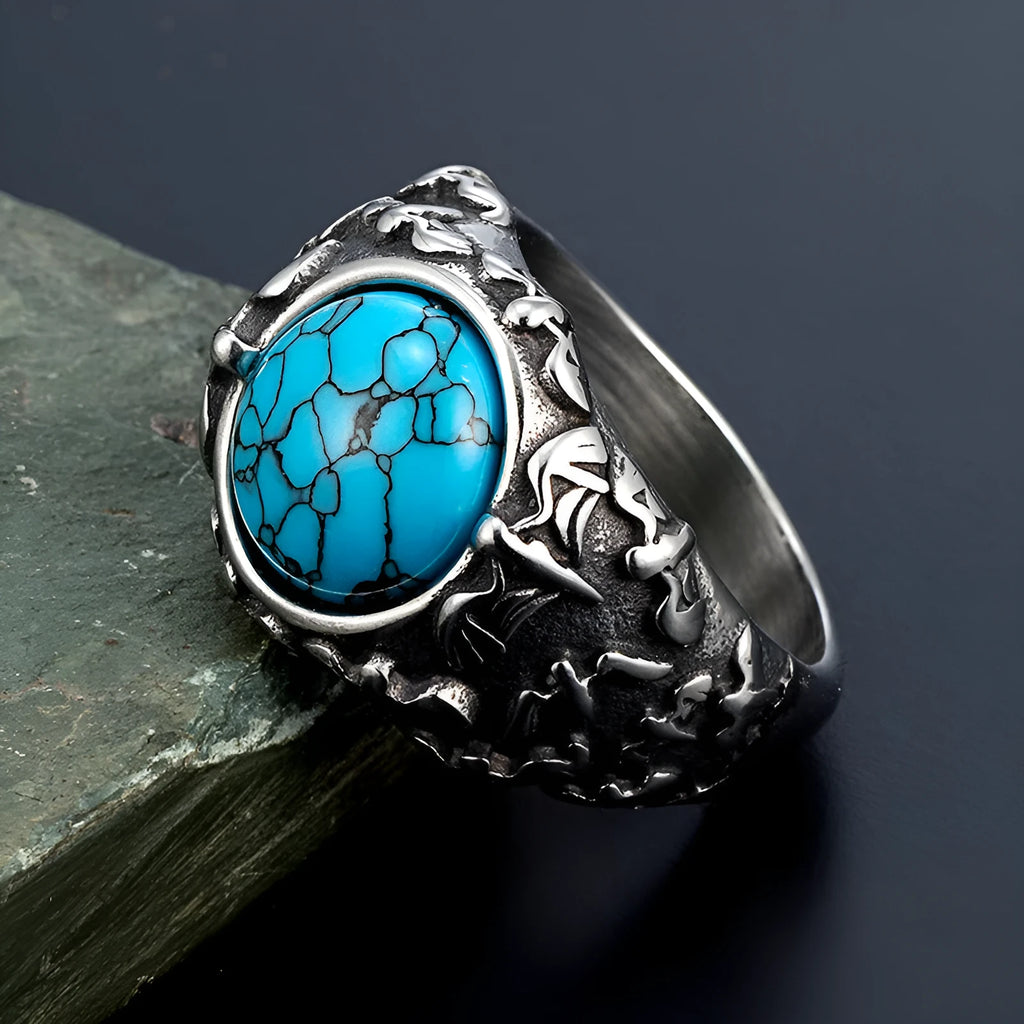 Retro titanium steel ring in steel colour, unisex design, showing surface detailing on solid metal band.