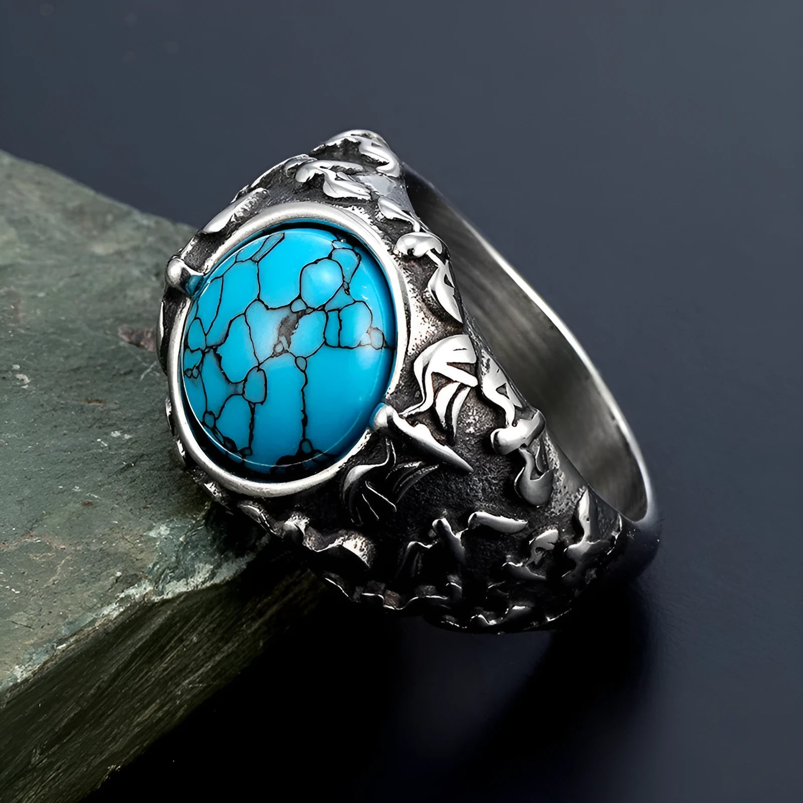 Retro titanium steel ring in steel colour, unisex design, showing surface detailing on solid metal band.