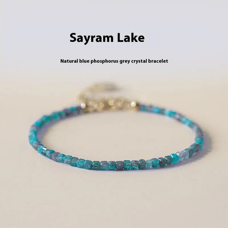 Women's natural blue apatite crystal bracelet with diamond-cut facets on adjustable band