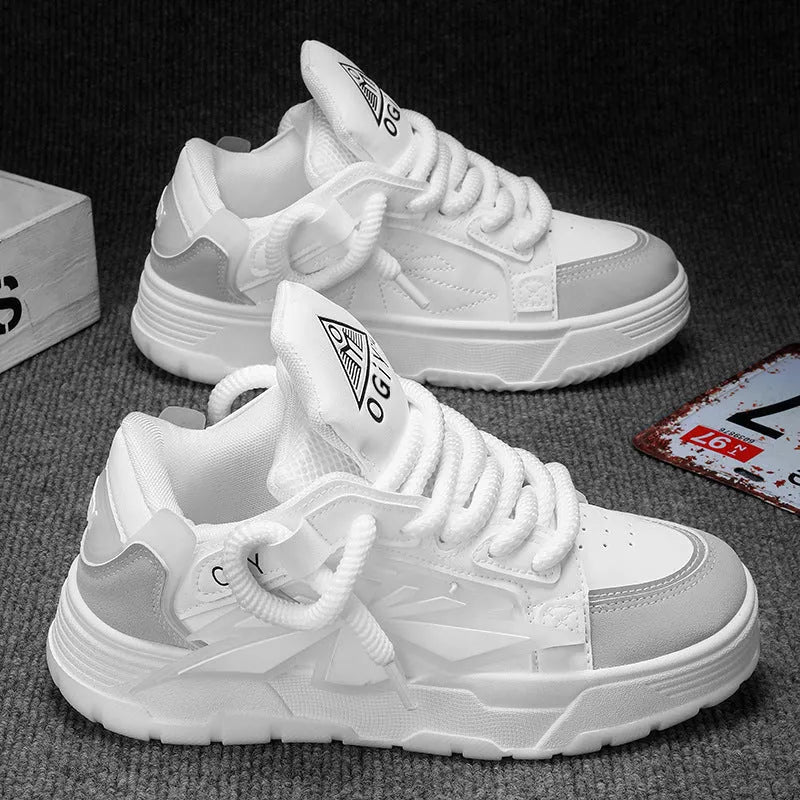 Men's white clunky casual sneakers with cartoon totem pattern, round toe, and lace-up front on a rubber sole.