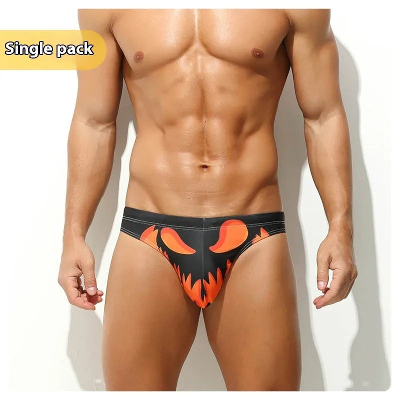 Men's low-waisted quick-drying briefs with digital print design on polyester fabric.