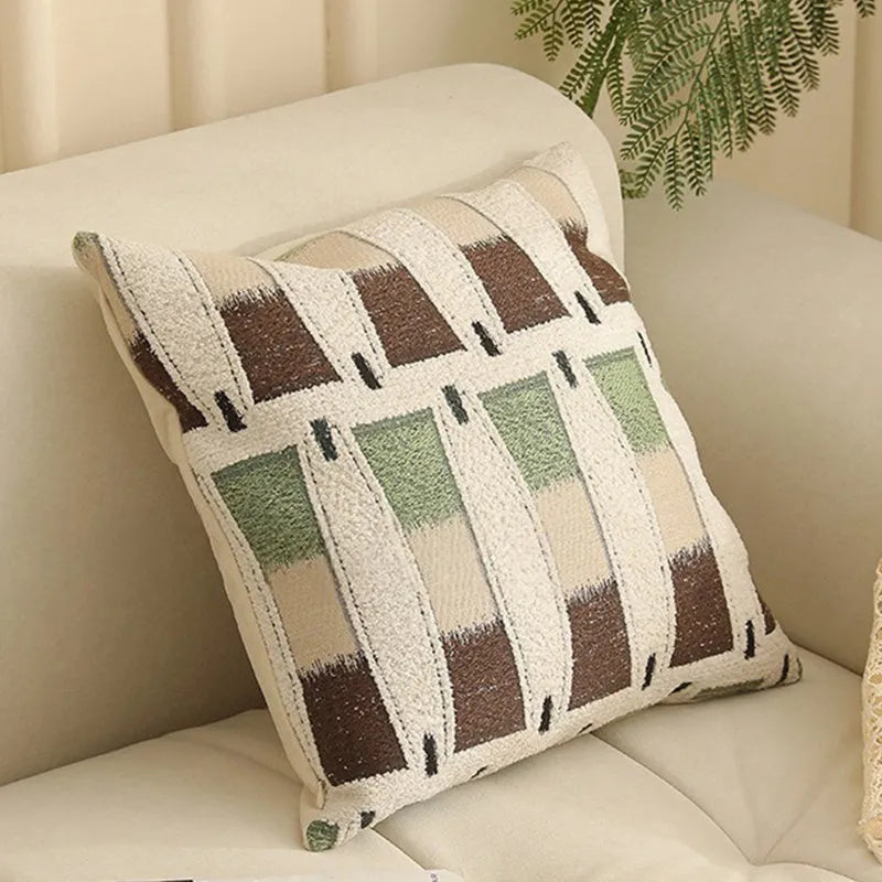 Close-up of a beige and green floral Jacquard woven cushion cover with textured pattern, 45cm square.