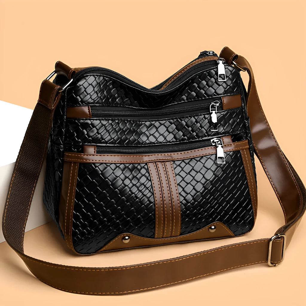 Brown PU leather messenger bag with multiple compartments and single shoulder strap