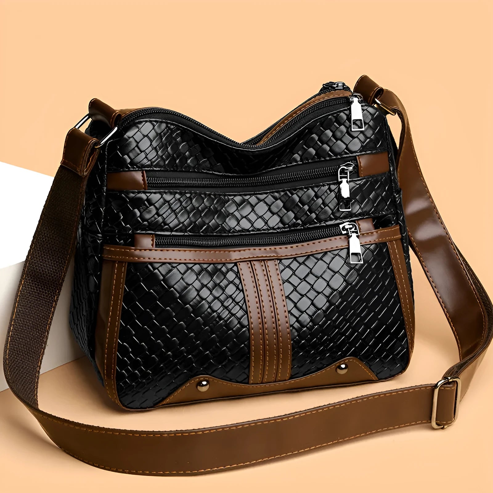 Brown PU leather messenger bag with multiple compartments and single shoulder strap