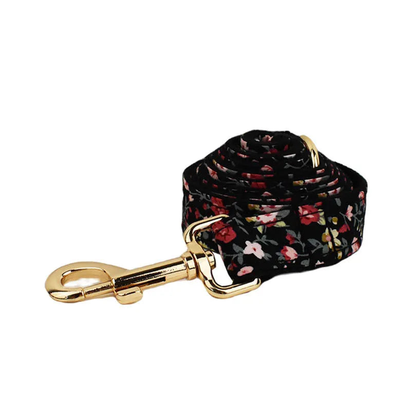 Cloth dog collar set with removable bow, printed lettering, matching leash, and vest in assorted colours