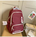 High school student backpack in waterproof nylon with curved shoulder straps and under 20L capacity