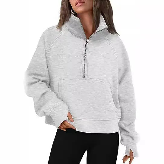 Loose lapel fleece-lined women's sweater in a solid colour, shown with raglan sleeves.