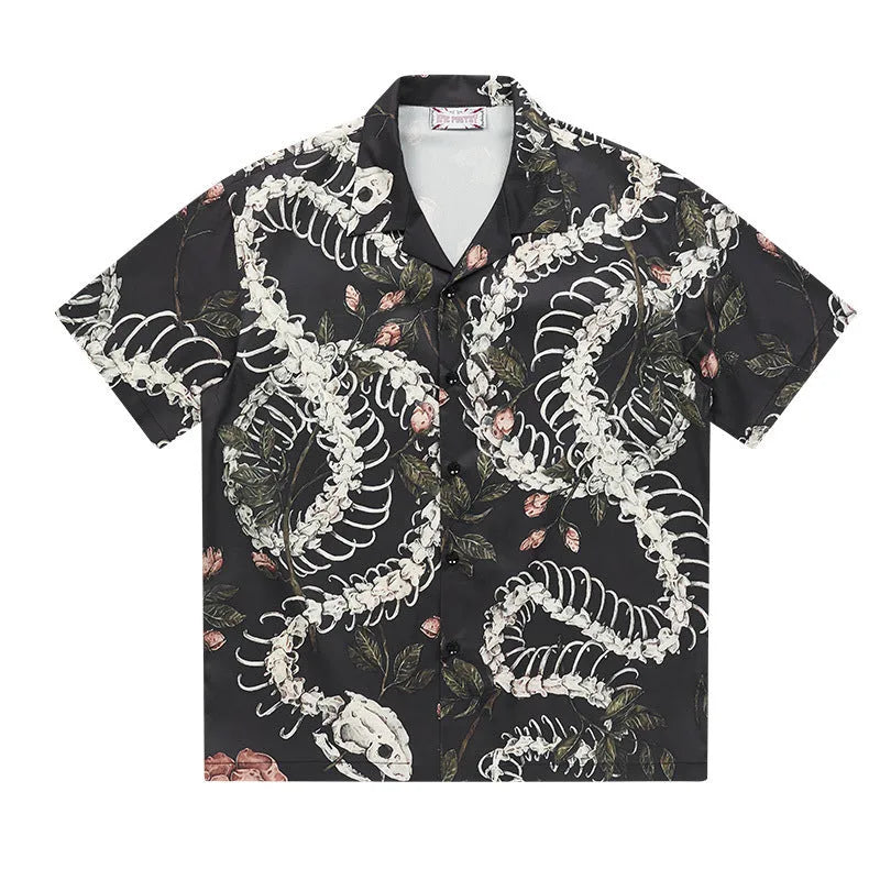 Short sleeve Cuban collar shirt with a printed snake bone and floral pattern in a loose fit.