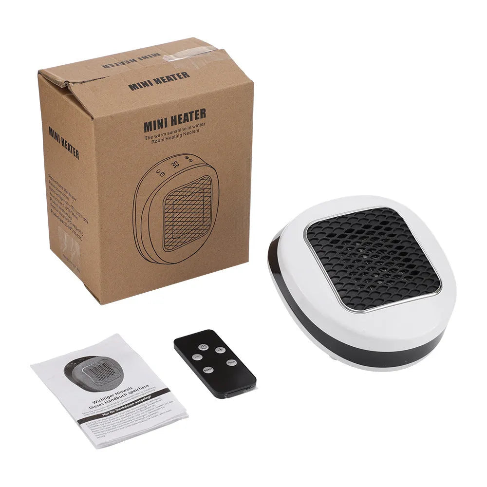 White portable ceramic electric heater with remote control on table