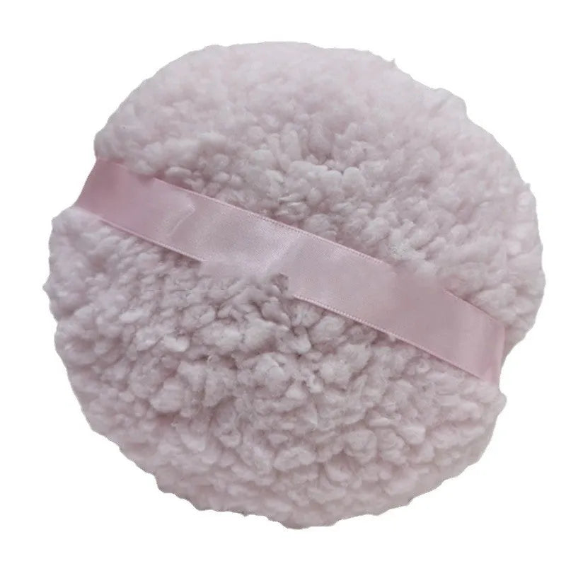 Oversized plush dry powder puff makeup applicator measuring 150x75mm in pink, white, and skin colour options
