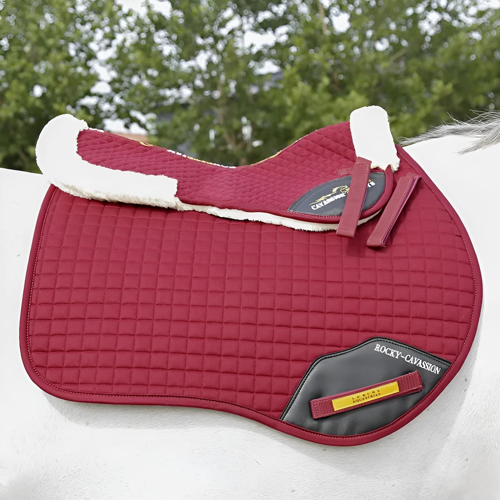 Riding saddle pad with wool construction for shock absorption and waist protection in equestrian sports