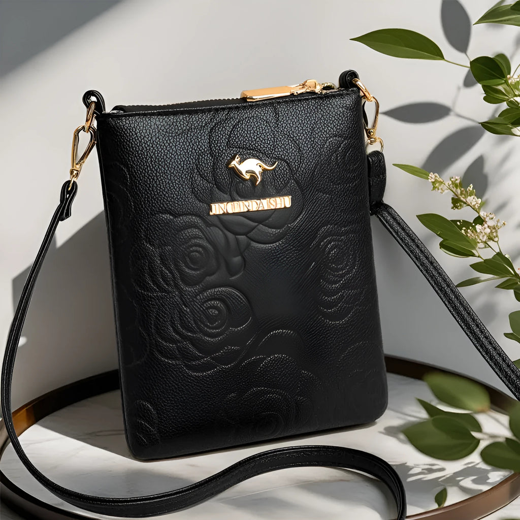 Square black rose pattern PU shoulder messenger bag with file organiser interior and shoulder strap.