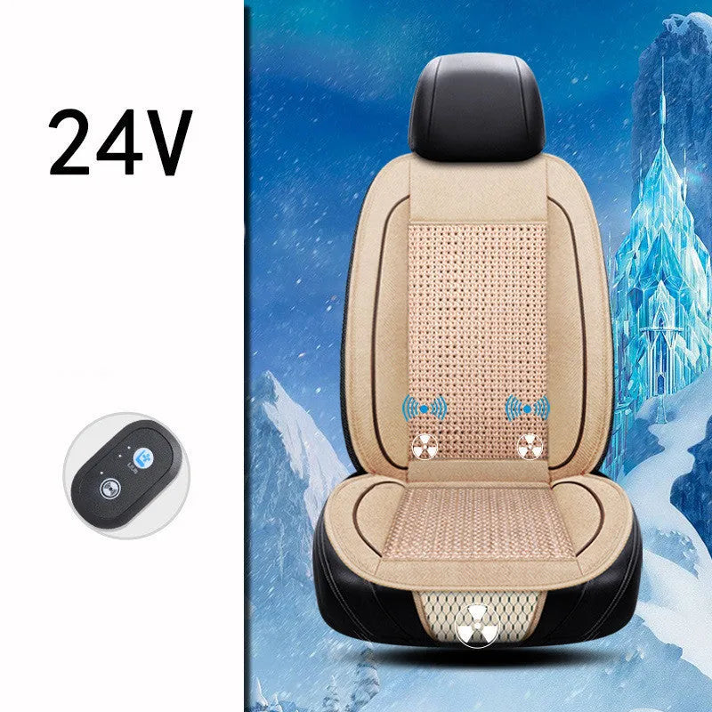 Black car ventilation seat cushion with power cord, shown on a car seat