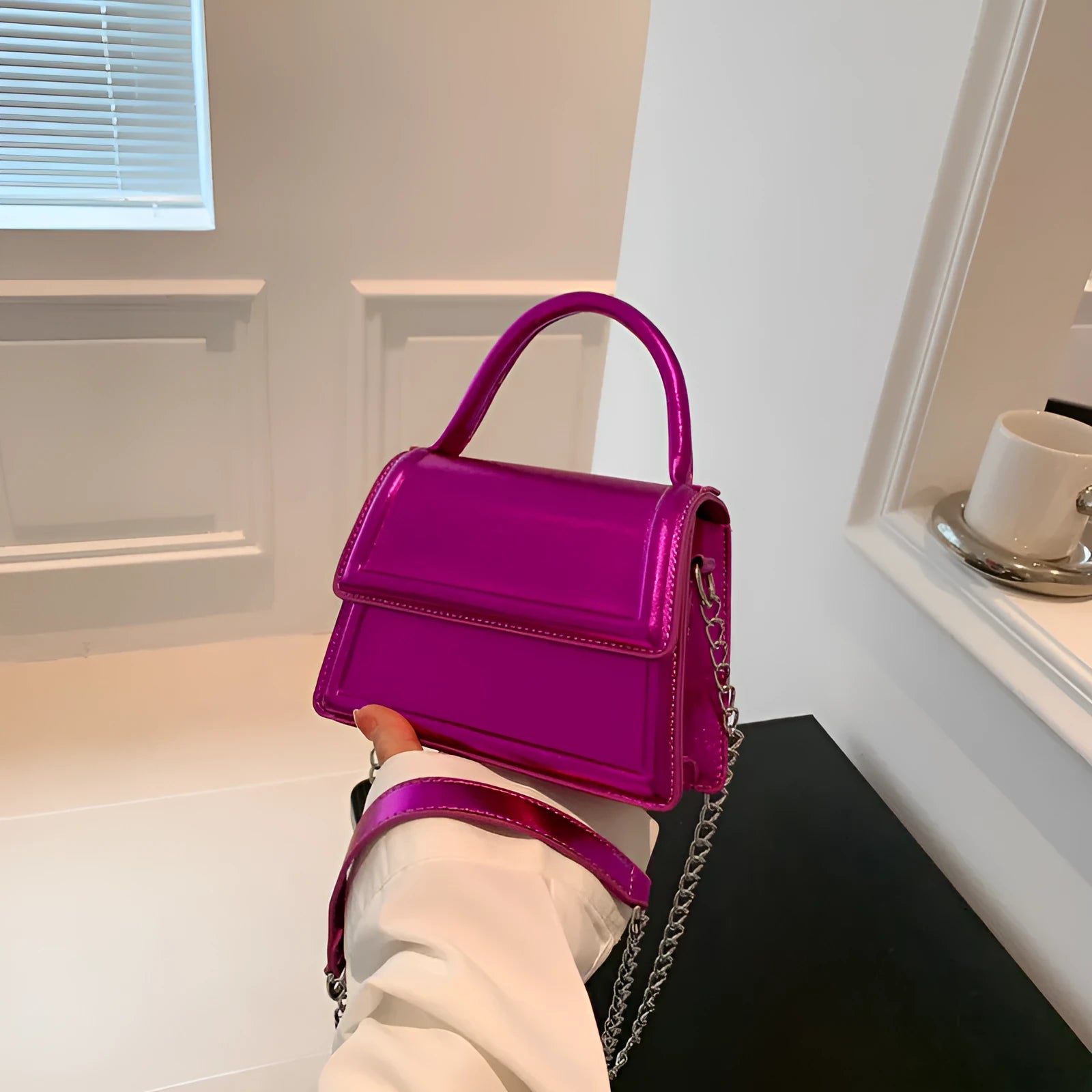 Retro square crossbody bag in PU leather with sewing line details, shown in a selection of colours.