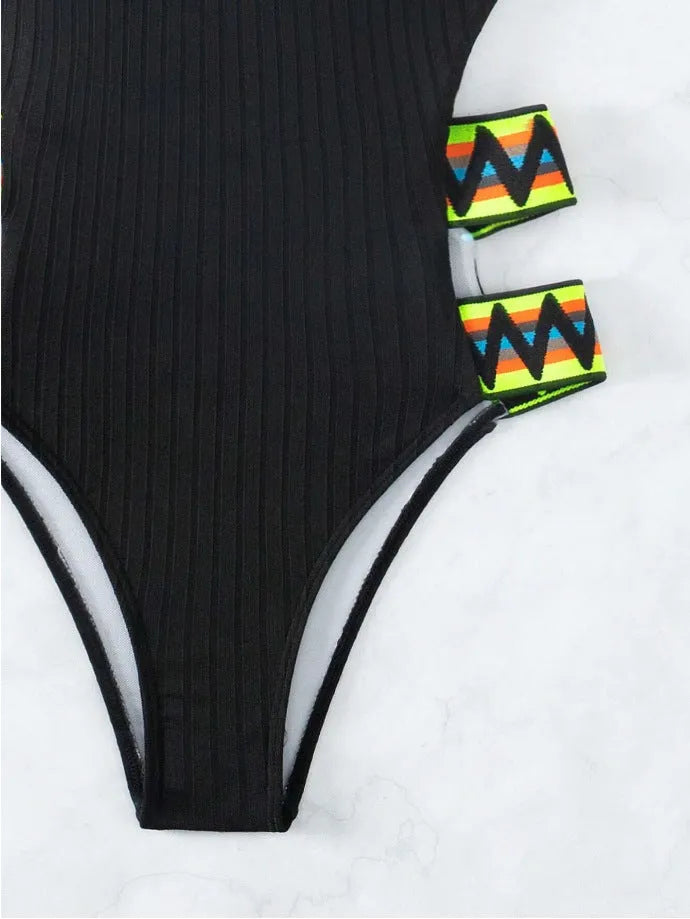 Women's solid colour one-piece swimming suit bikini in black or orange