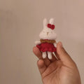 Hand-crocheted wool rabbit key chain pendant in amigurumi style