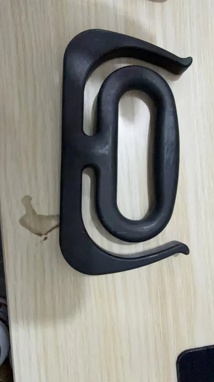 Plastic storage bag handle rack in black, 17.3 x 9.2 cm, with bag handles attached