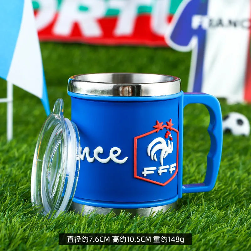 World Cup soccer mug souvenir in team colours, rubber and metal construction, 7.6cm diameter