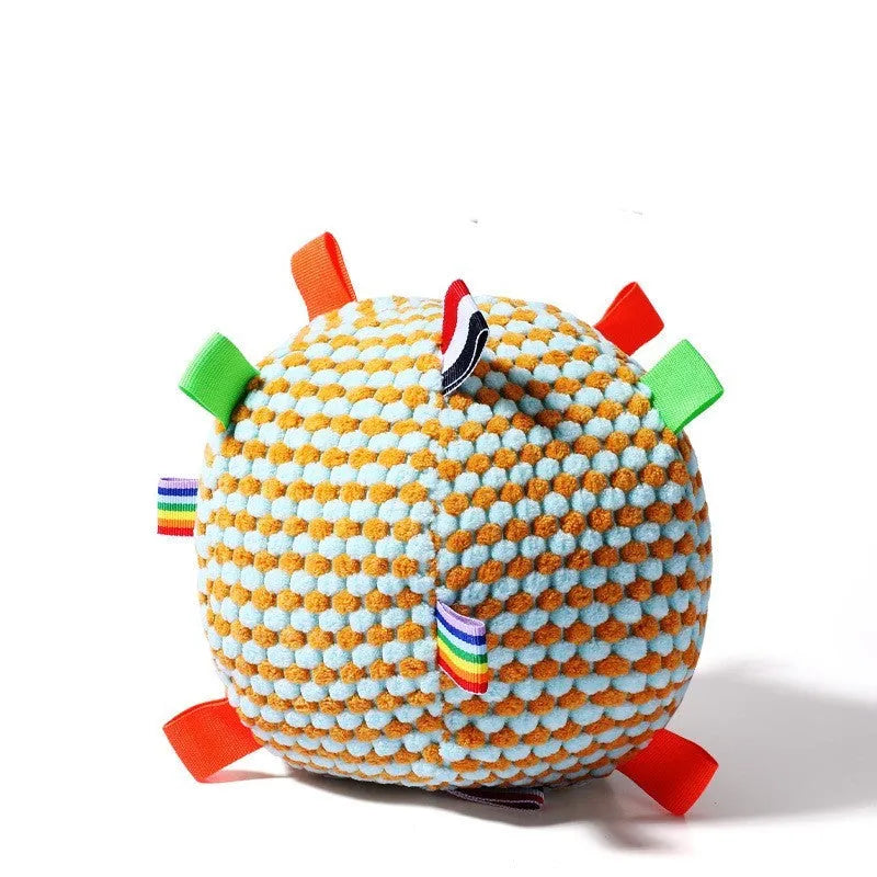 Blue and yellow textured pineapple lattice dog ball with vent holes, 17cm in diameter.
