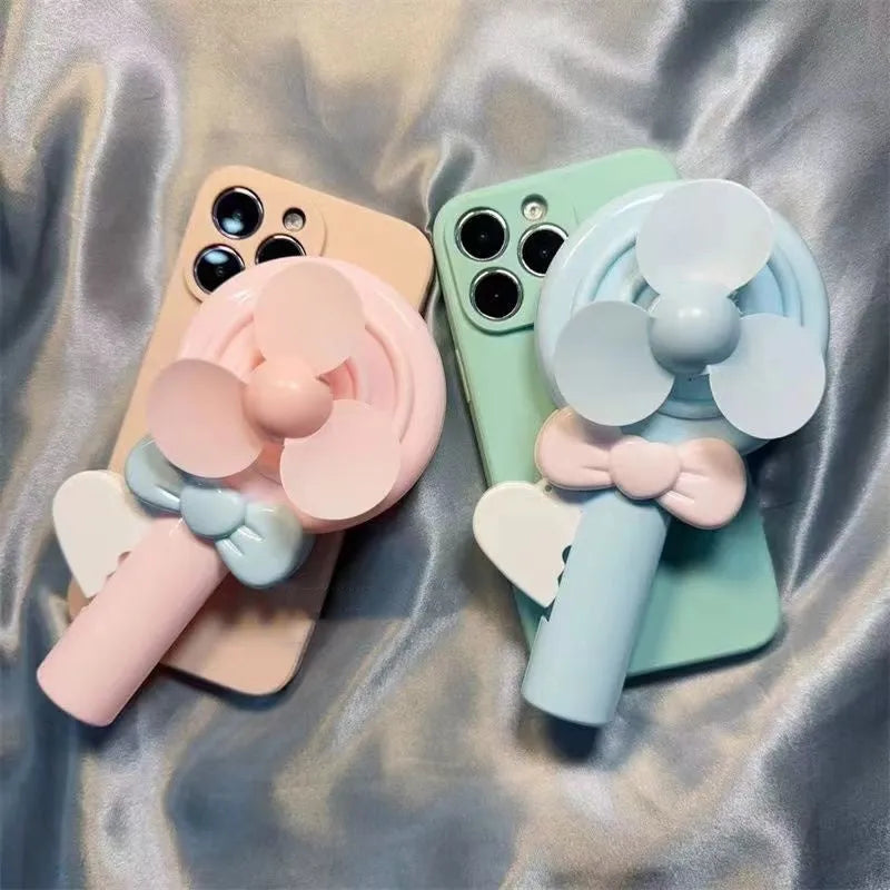 Lollipop hand fan drop-resistant soft TPU phone case in cyan and pink for iPhone models 6 to 15 Pro Max.