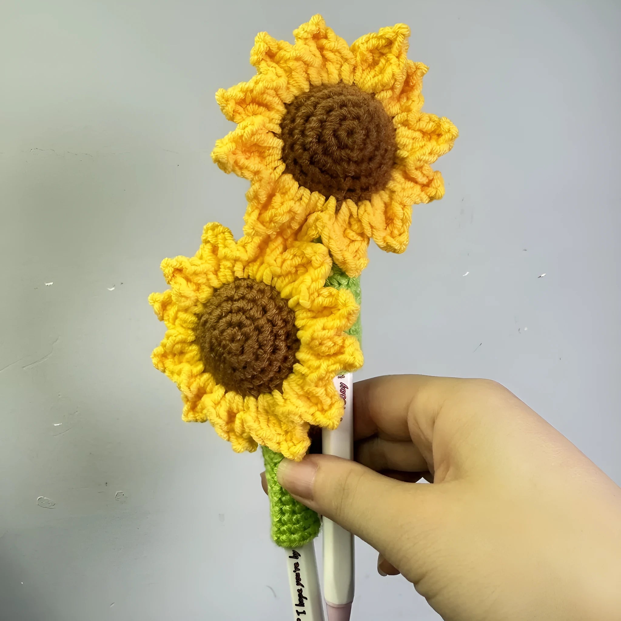 Hand-woven sunflower design pen cover in natural fabric for teacher gifts