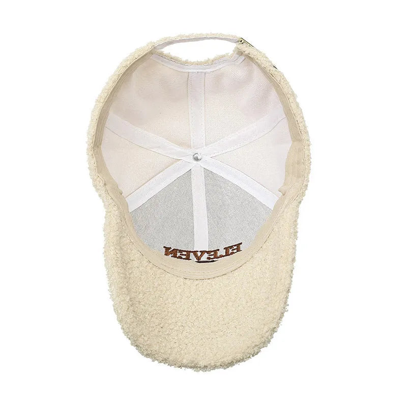 Adjustable winter baseball cap in polyester lambskin fabric showing dome crown style
