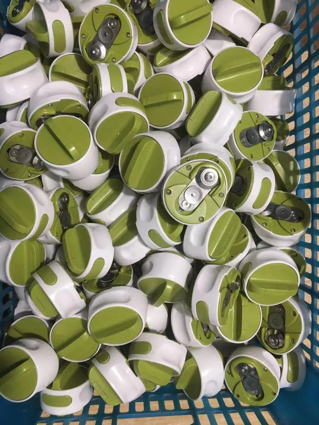 Stainless steel lid opener tool for jars and bottles in green or red colour