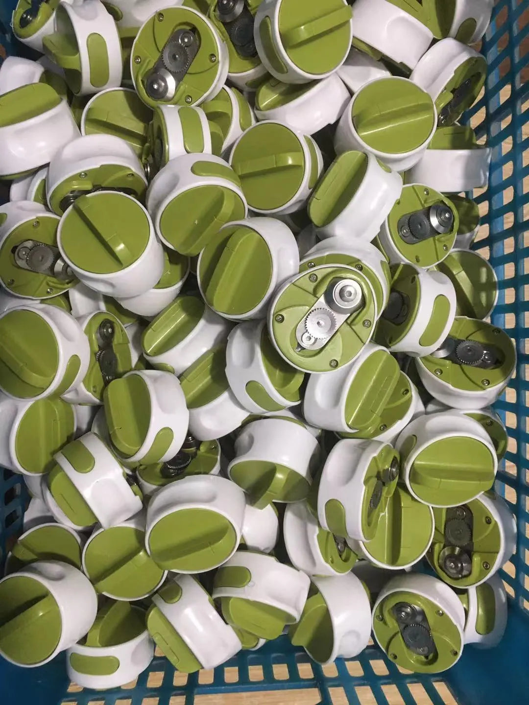 Stainless steel lid opener tool for jars and bottles in green or red colour