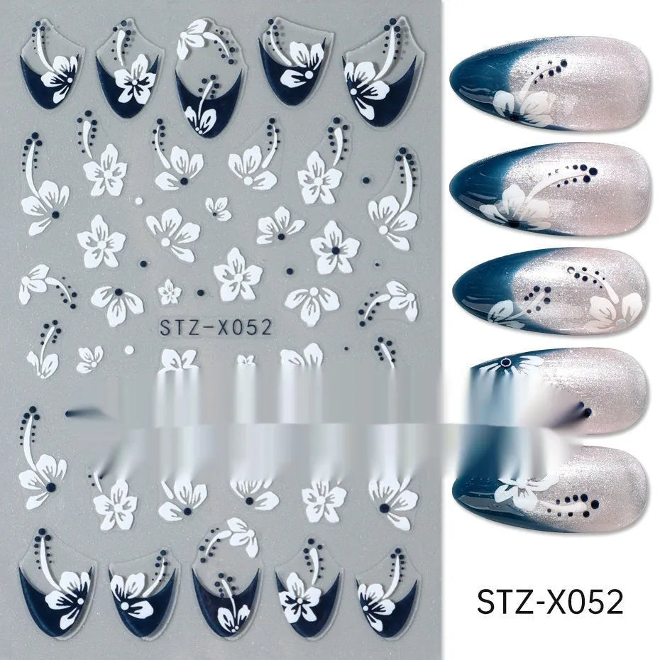 Black and silver stripe nail art sticker with a love pattern design on a plastic sheet.