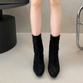 Square toe kitten heel booties with side zipper in brown – front view