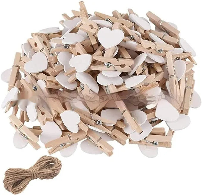 Set of five heart-shaped wooden hair clips in red, pink, white, and yellow colours.