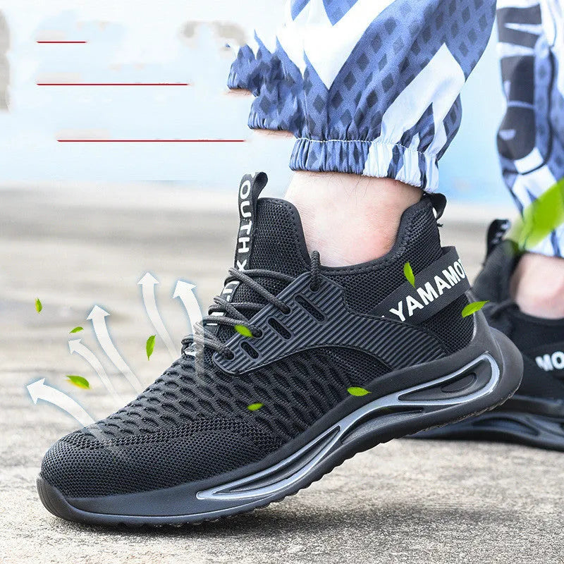 Black ultra-light steel toe anti-piercing work shoes with fly woven upper and low-top design on a white background