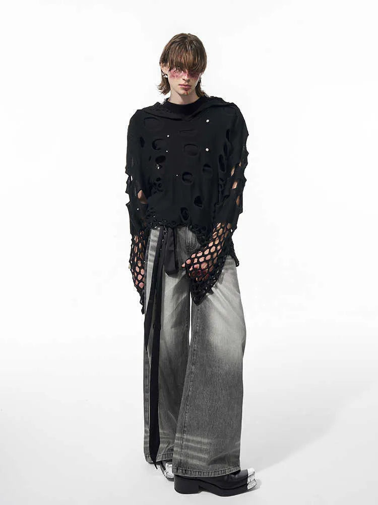 Black men's loose hoodie with pearl bead trim detail on the front of the hood.