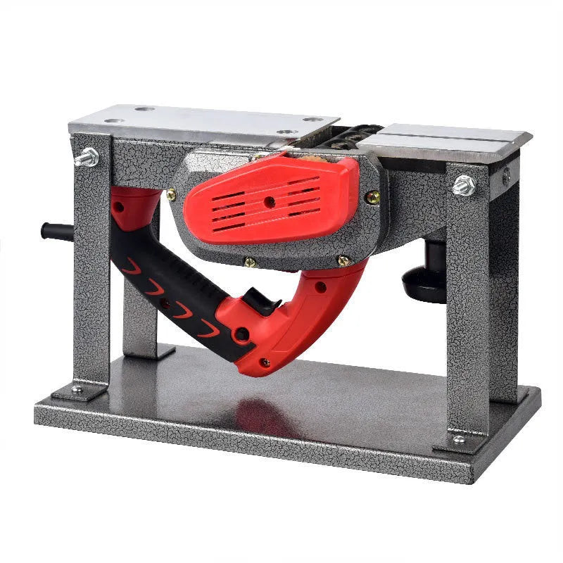Red desktop electric wood planer with aluminium body, showing 82mm planing width and depth adjustment controls