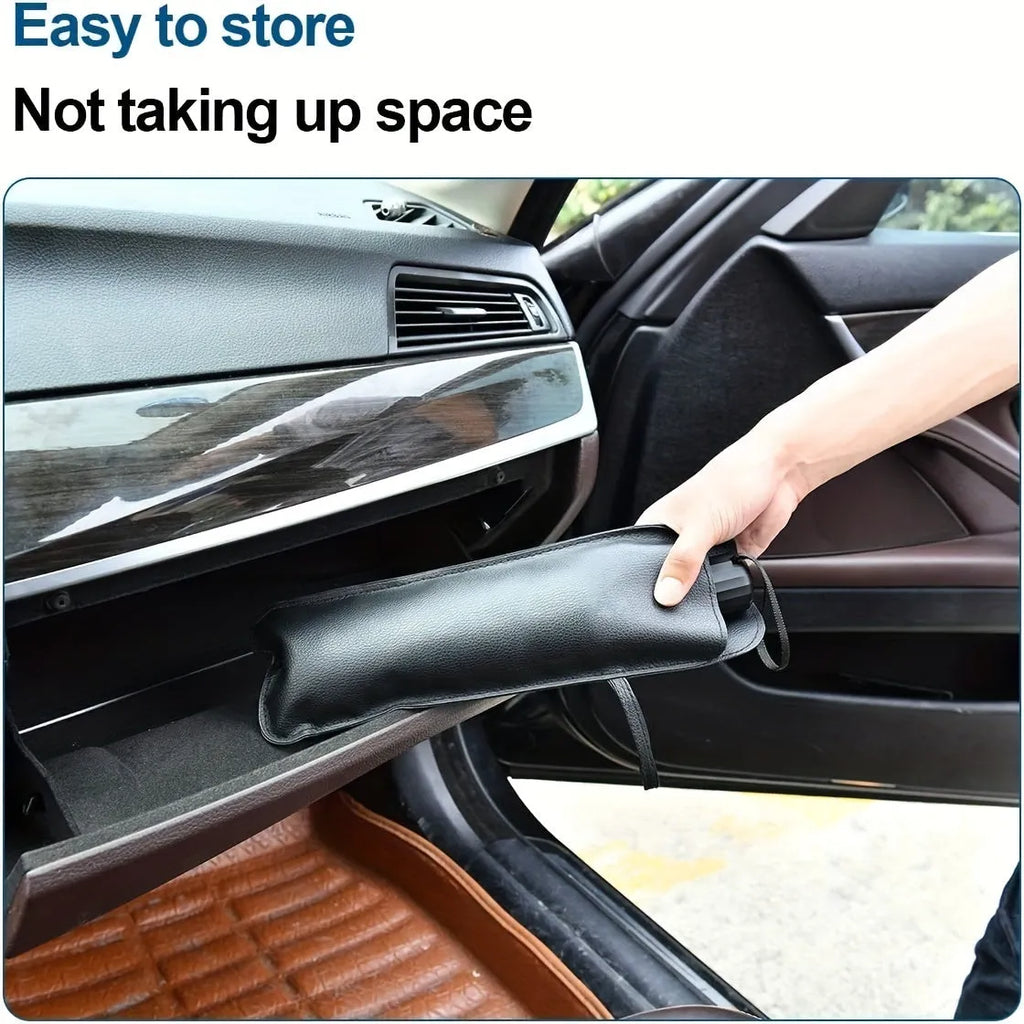 Foldable car windshield sunshade umbrella shown open against vehicle glass