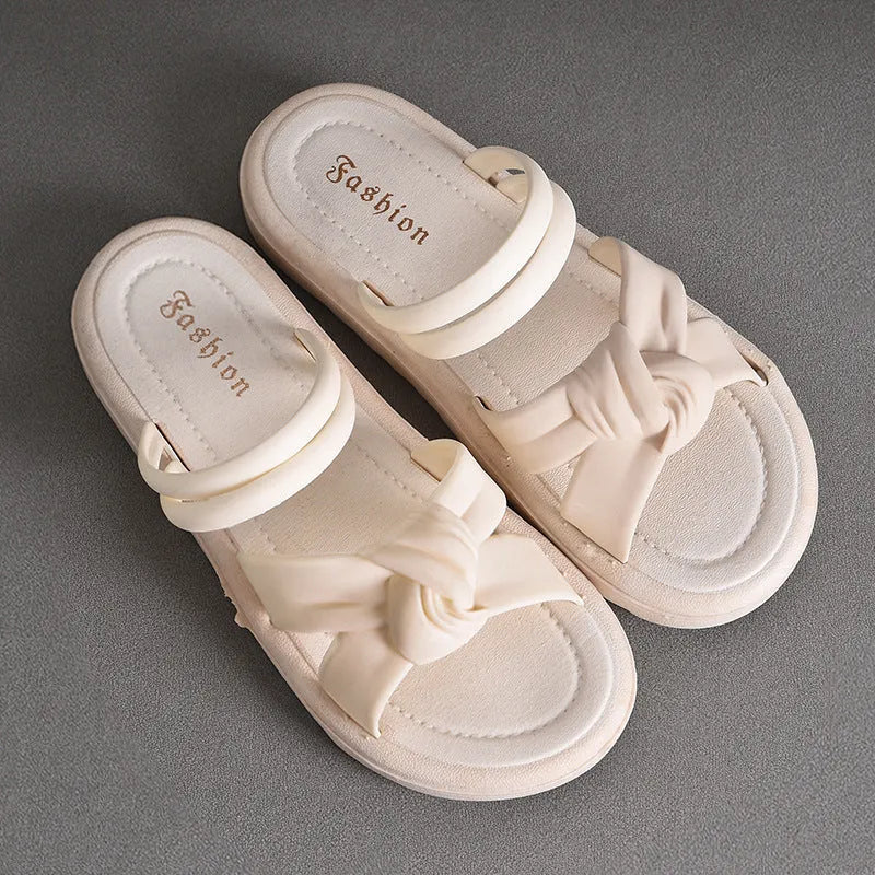 Women's black and white two-way wear sandals with soft thick back and non-slip PVC sole.