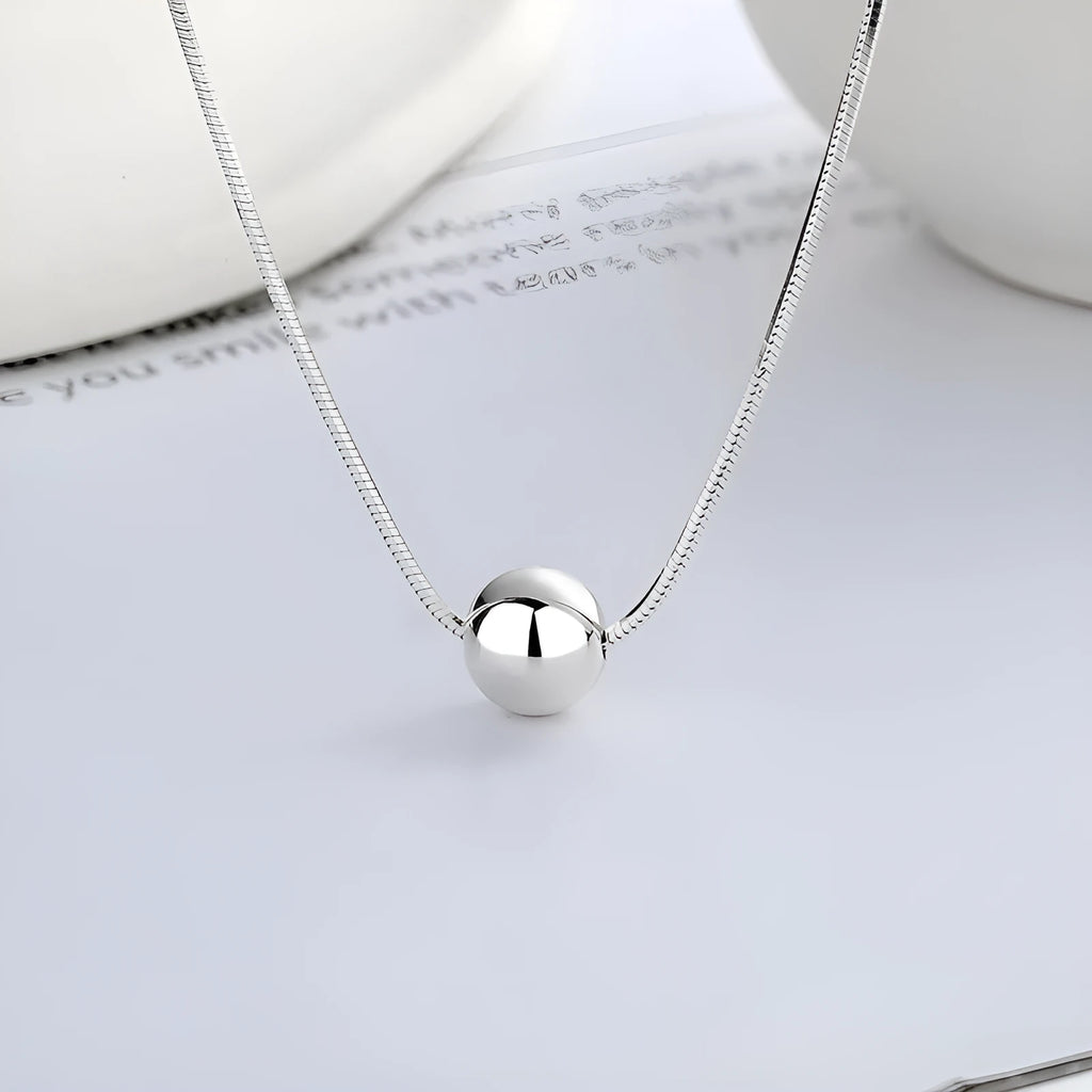 Small spherical pendant silver clavicle chain necklace with round elements and 925 sterling silver construction