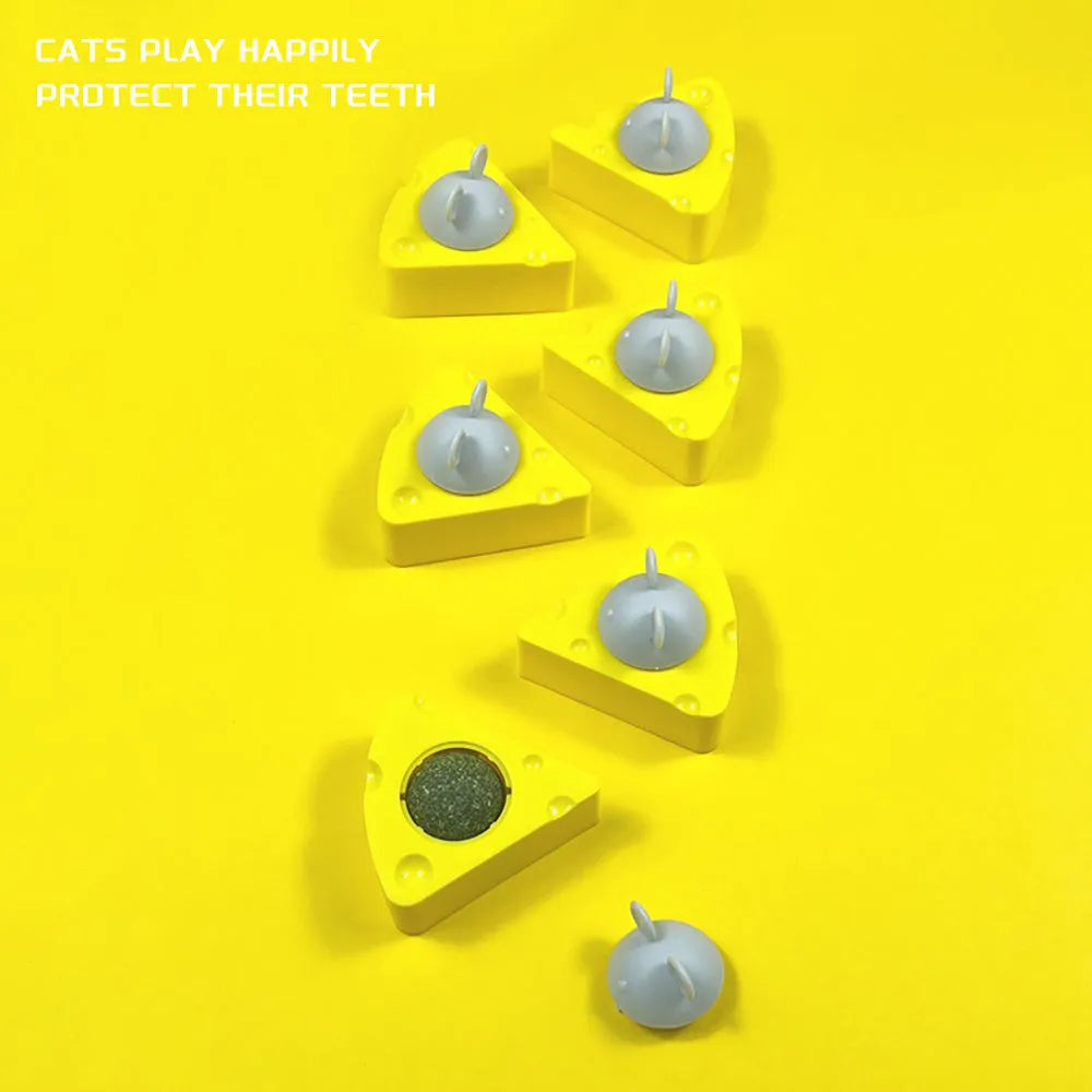 Yellow catnip and silvervine chew toy balls for indoor cat teeth cleaning