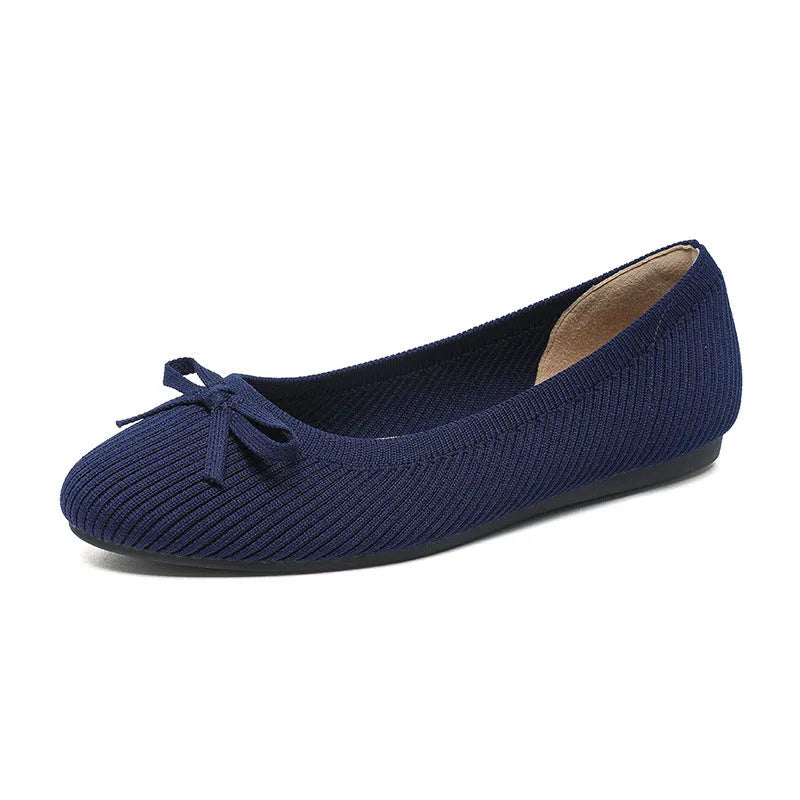 Women's round toe fabric flat pumps with bow detail and oversleeve design in butterfly black colour