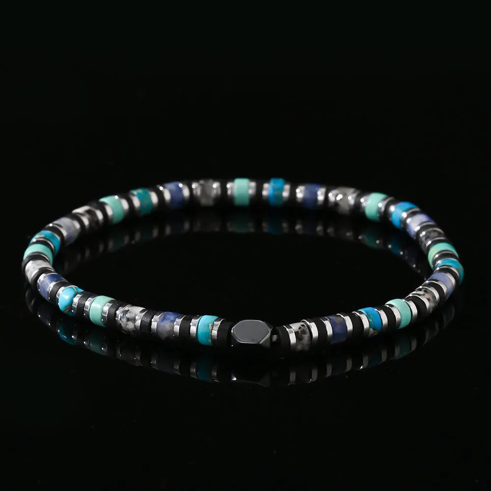 Hand-woven bohemian cylindrical bracelet with natural semi-precious stones in geometric arrangement