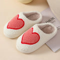 Plush women's cartoon slipper with non-slip PVC sole in Big Love pattern.
