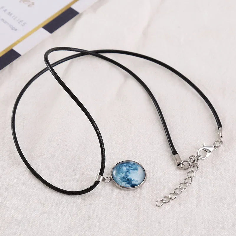 Moon night sky constellation glass pendant on a luminous alloy necklace chain with extension.