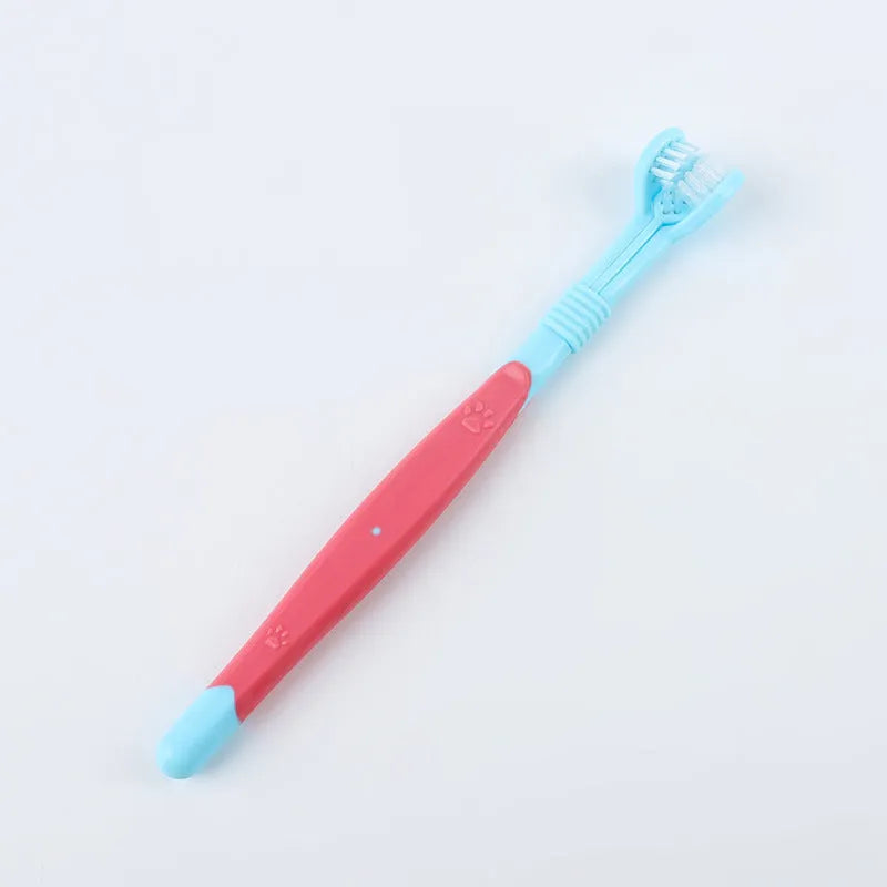 Pet toothbrush with nylon bristles and plastic handle in green colour