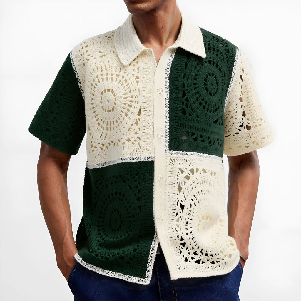 Beige colourblock men's short sleeve knitted shirt with flocking detail on a hanger.