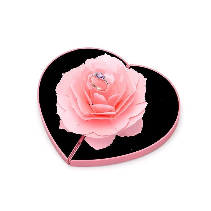 Red heart-shaped rotating ring box with 3D love motif and rose decoration for jewellery packaging