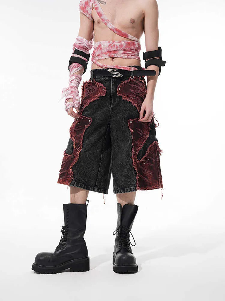 Distressed denim cropped pants with wide-leg cut and mid-high waist in cotton fabric