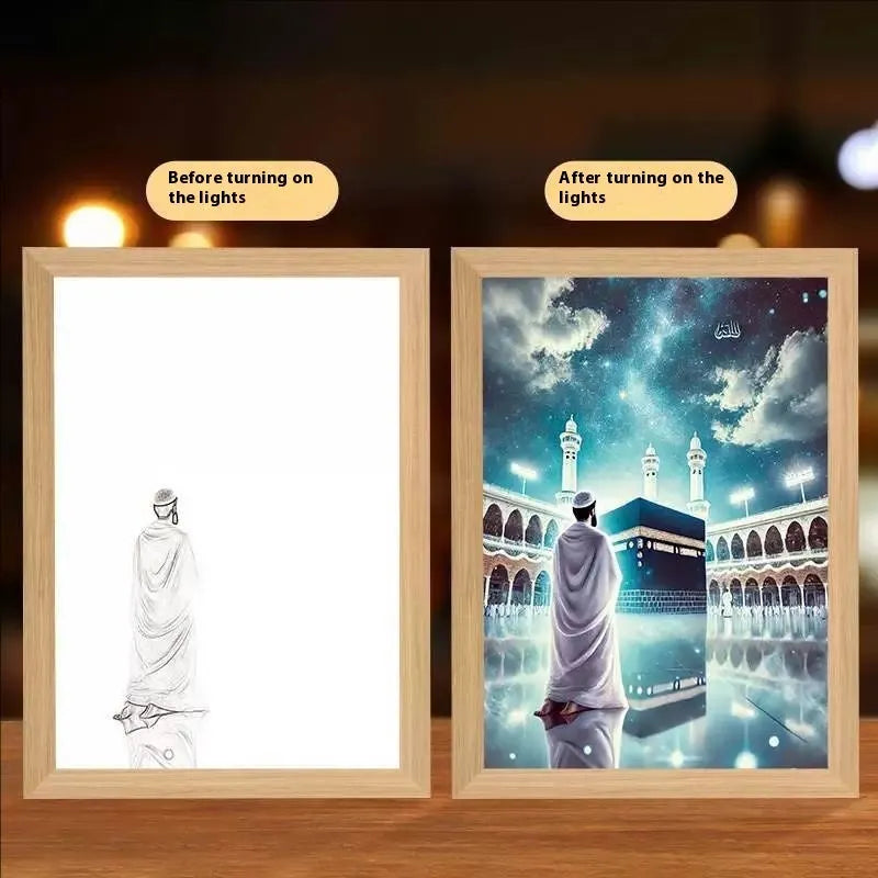 Handmade rectangular LED light painting photo frame showing a spiritual cross design, with USB cable.