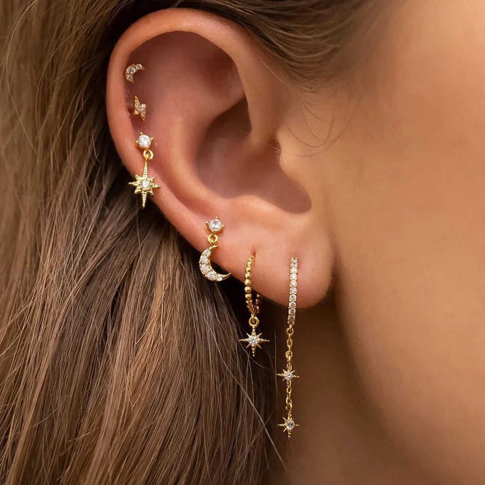 XINGX gold electroplated chain tassel earrings with zircon studs, six-piece set showing three complete pairs