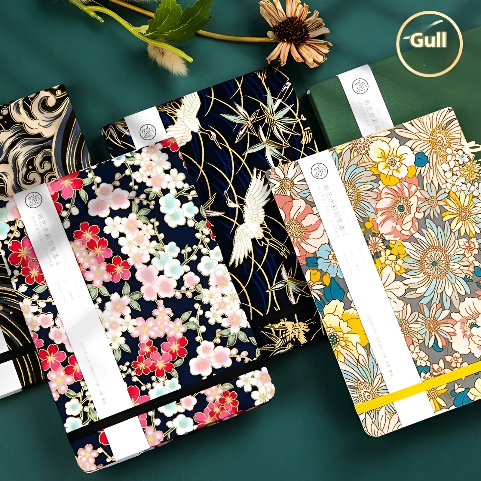 Feiluniao handmade fabric watercolour notebook with illustrated cover, open to show blank paper pages.