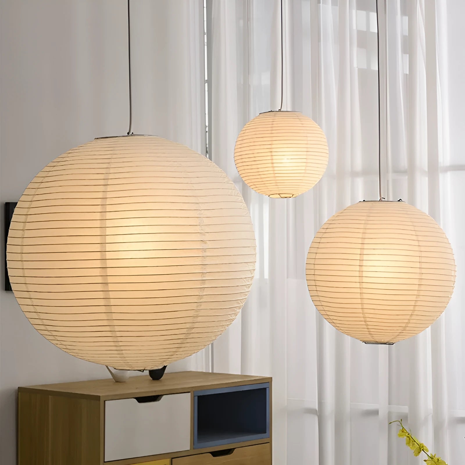 Modern paper pendant lamp with circular flat shade in natural paper material